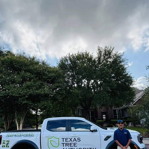 A crew member in front of a truck in Boerne, TX